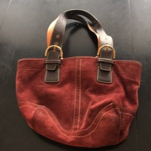 Coach rust colored suede bucket bag